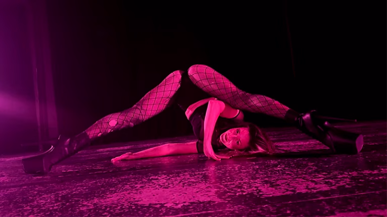 Dance teacher performing a shoulder roll to promote a FloorTrix class in Brisbane