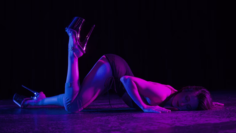 Dance instructor performing a sensual floorwerk choreo routine in Brisbane