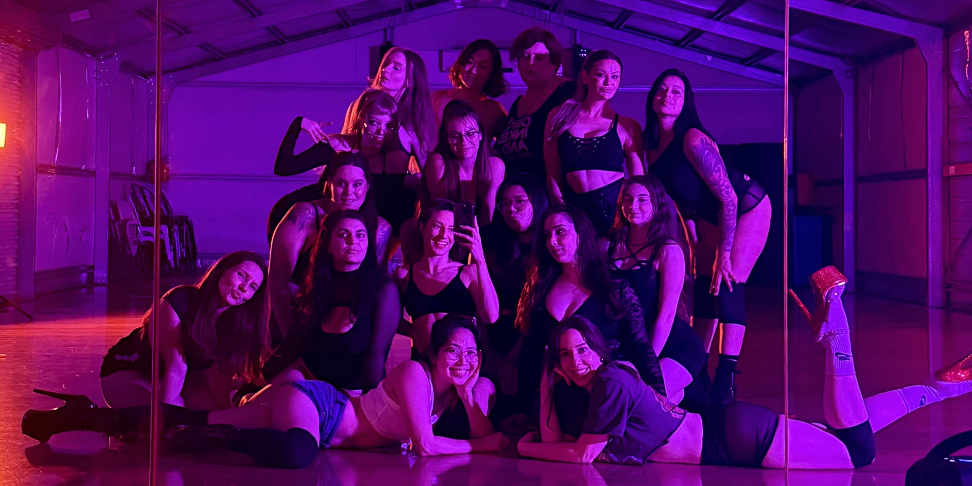 dance class of women dressed in colourful outfits at a dance school